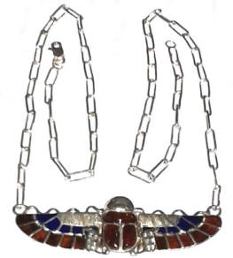 Sterling silver scarab with lapis and amber, includes chain.