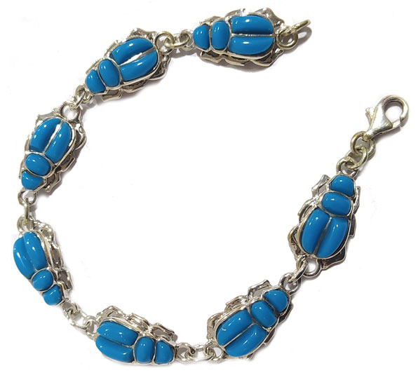 Scarab bracelet in 900 silver with inlaid turquoise stones.