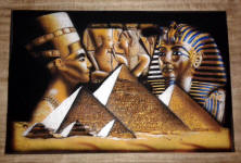 Egyptian Papyrus Painting:  Nefertiti, Ramses, Nefertari and Mask of King Tut Rising over the Pyramids on Dark Papyrus